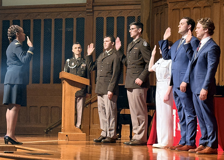 students taking their military oath
