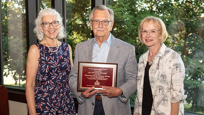 Dr. Spolnik with the Alumni Association Award