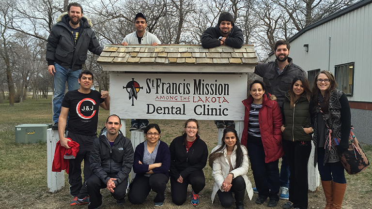 IUSD students outside a clinic in Lakota territory