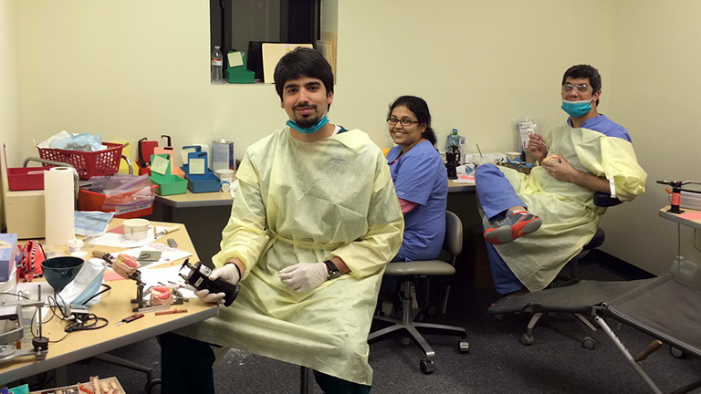 iusd students in a clinic in Lakota territory