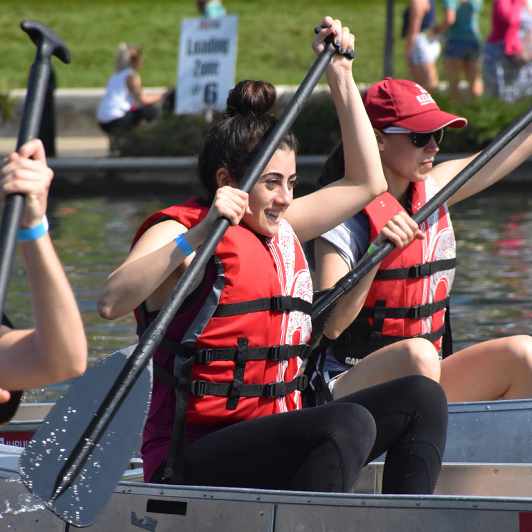 Students paddle on the water in IUPUI’s annual Regatta.